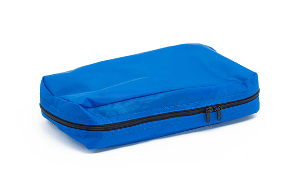 A filled and zipped closed Island (blue) Aether End Pocket Aeronaut 30 Packing Cube.